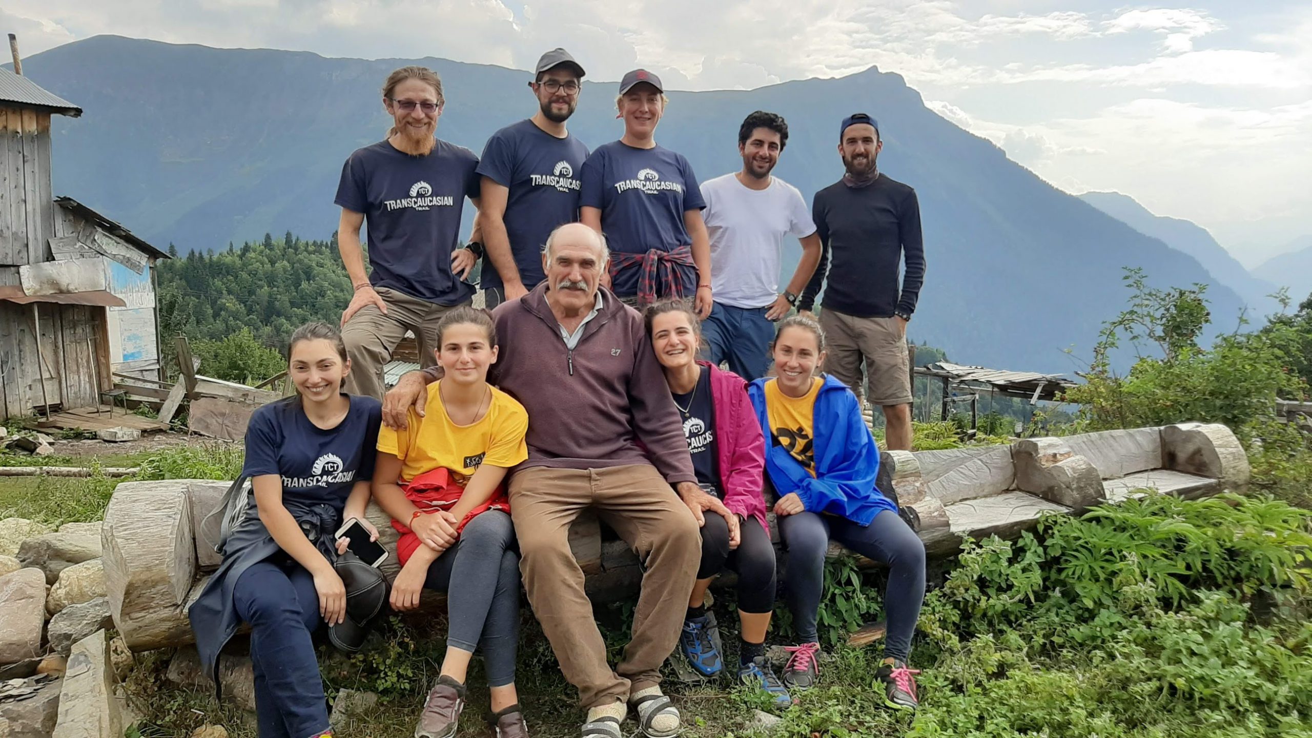 A TCT Georgian youth crew with local legend Valeri, who is part of the last family living in Kichkhuldash, Svaneti.