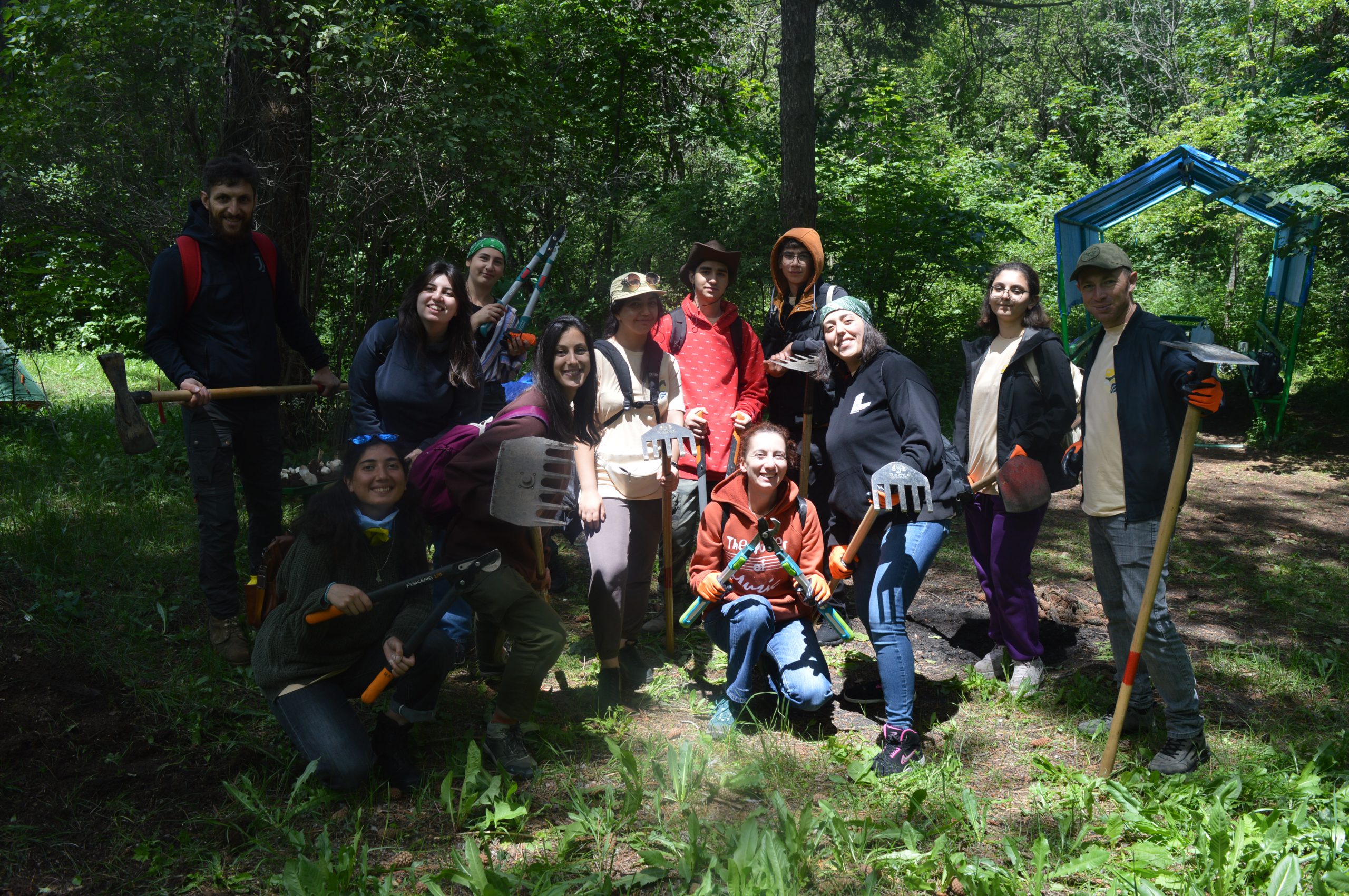 Weekend Camp Sevan participants enjoyed learning how to use various trailbuilding tools in Sevan, Armenia. Photo by Arpine Nikolyan.