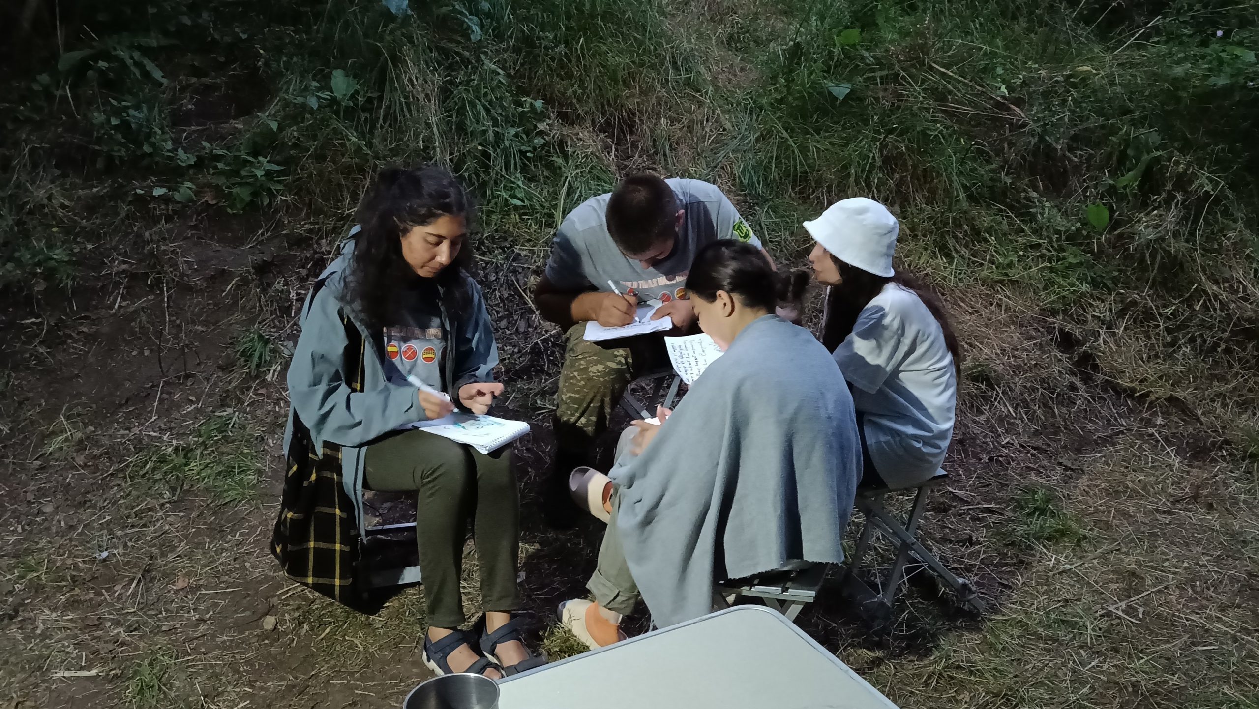 Volunteers in Dilijan National Park engage in activities after they return from the field. Photo by Vahagn Vardumyan.