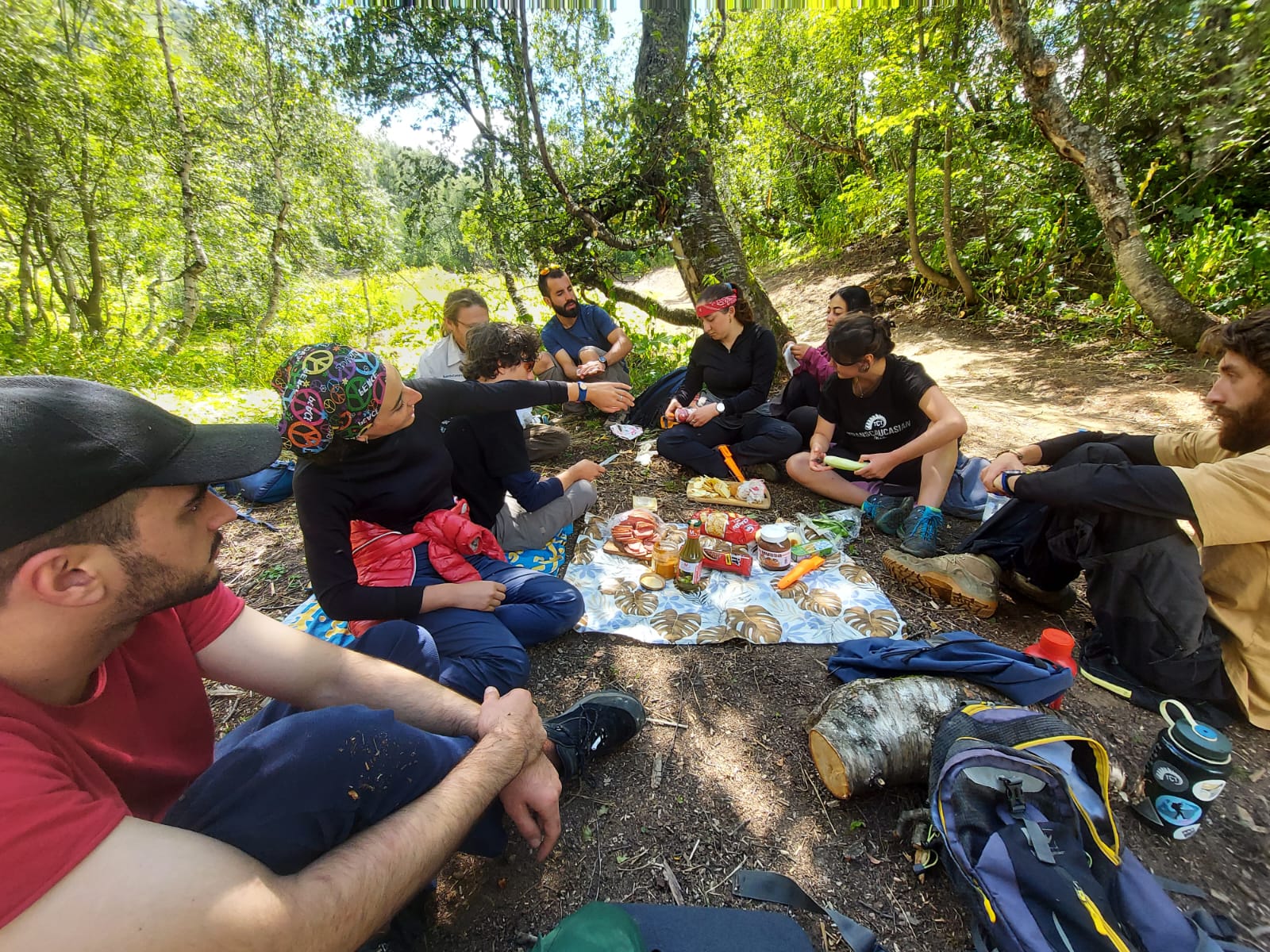 Georgians and Armenians take a break from trail building to share a meal.