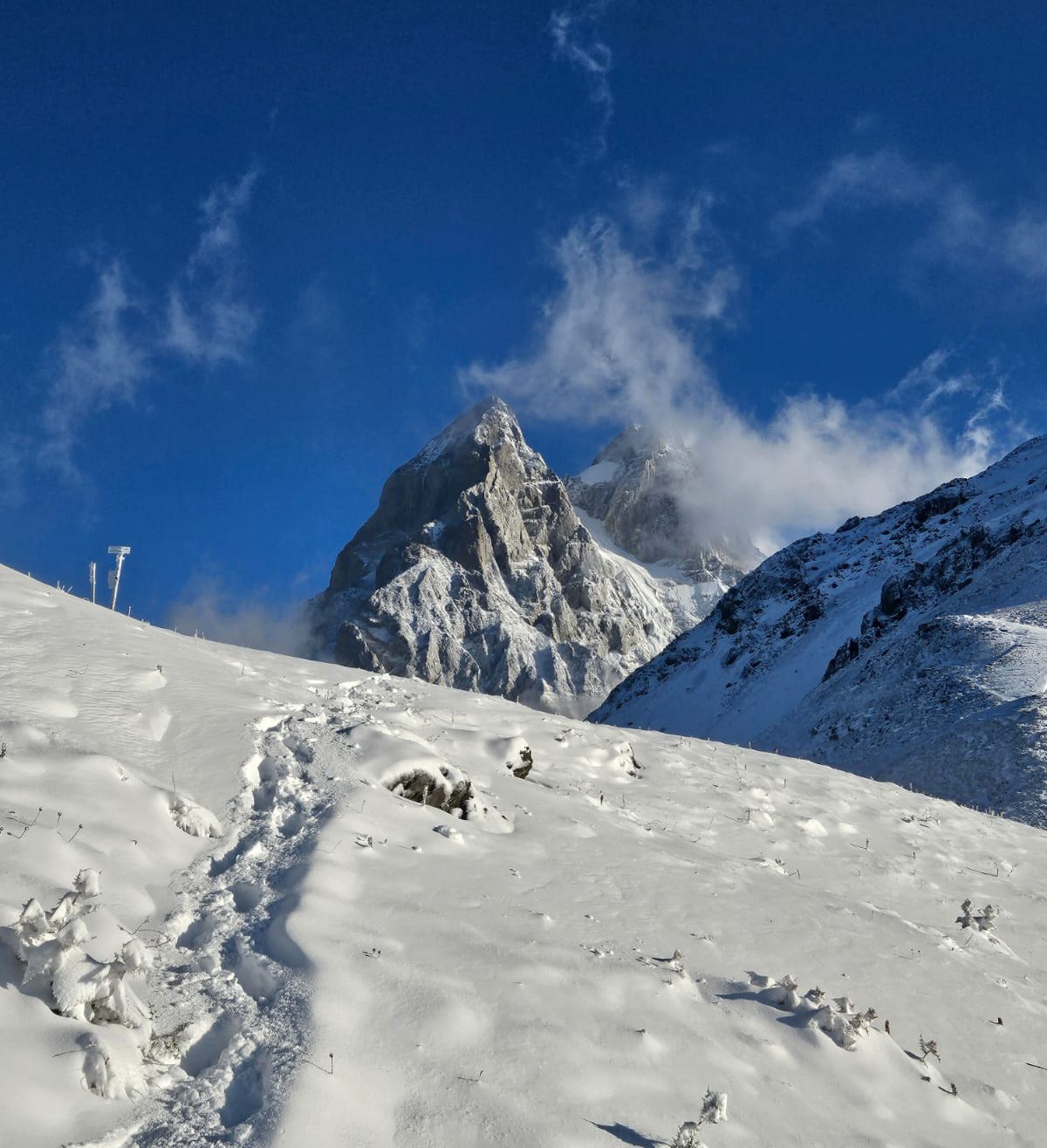 Descending from Guli Pass (2978m) towards Mestia after a snowy September night in Svaneti, Georgia.    Photo by Kobi Lee